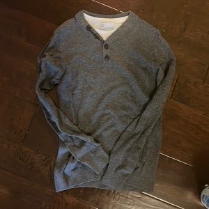 grey button up sweater with white lining underneath! super trendy and cute!